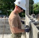 U.S. Navy Seabees with NMCB-5’s Detail Timor-Leste construct a school in support of the National Institute of Health in Dili