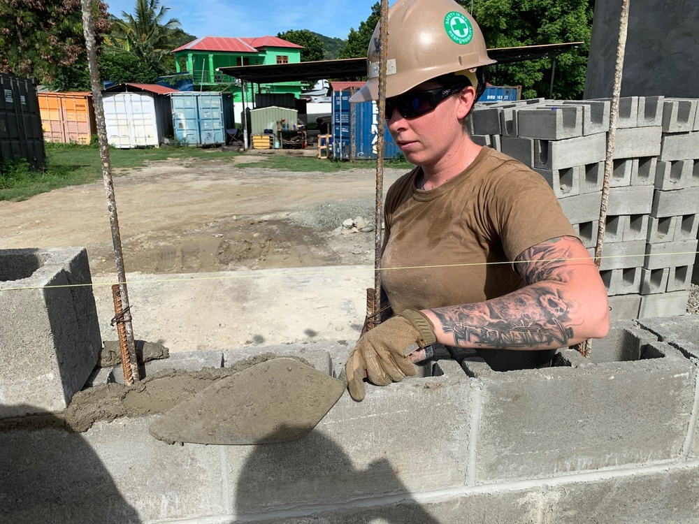 U.S. Navy Seabees with NMCB-5’s Detail Timor-Leste construct a school in support of the National Institute of Health in Dili