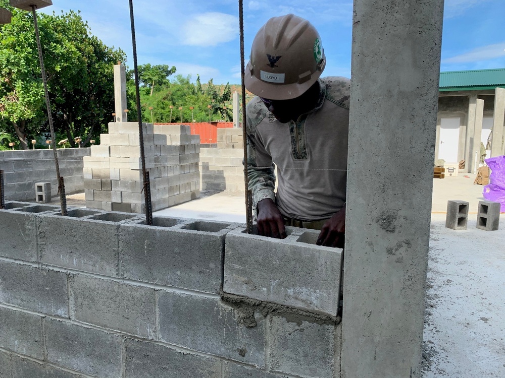 U.S. Navy Seabees with NMCB-5’s Detail Timor-Leste construct a school in support of the National Institute of Health in Dili