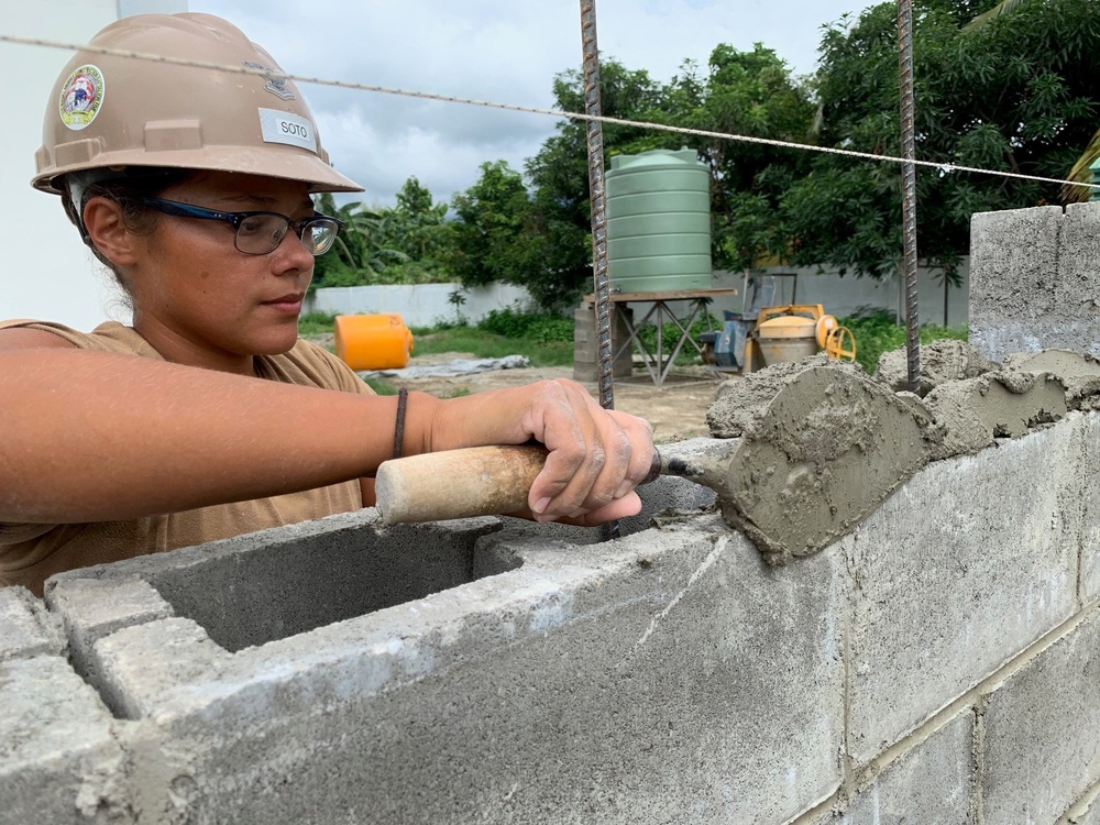 U.S. Navy Seabees with NMCB-5’s Detail Timor-Leste construct a school in support of the National Institute of Health in Dili