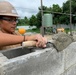 U.S. Navy Seabees with NMCB-5’s Detail Timor-Leste construct a school in support of the National Institute of Health in Dili