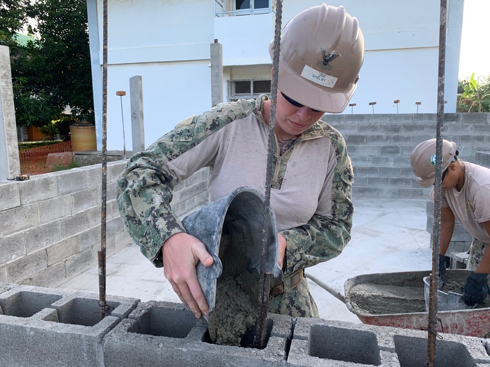 U.S. Navy Seabees with NMCB-5’s Detail Timor-Leste construct a school in support of the National Institute of Health in Dili