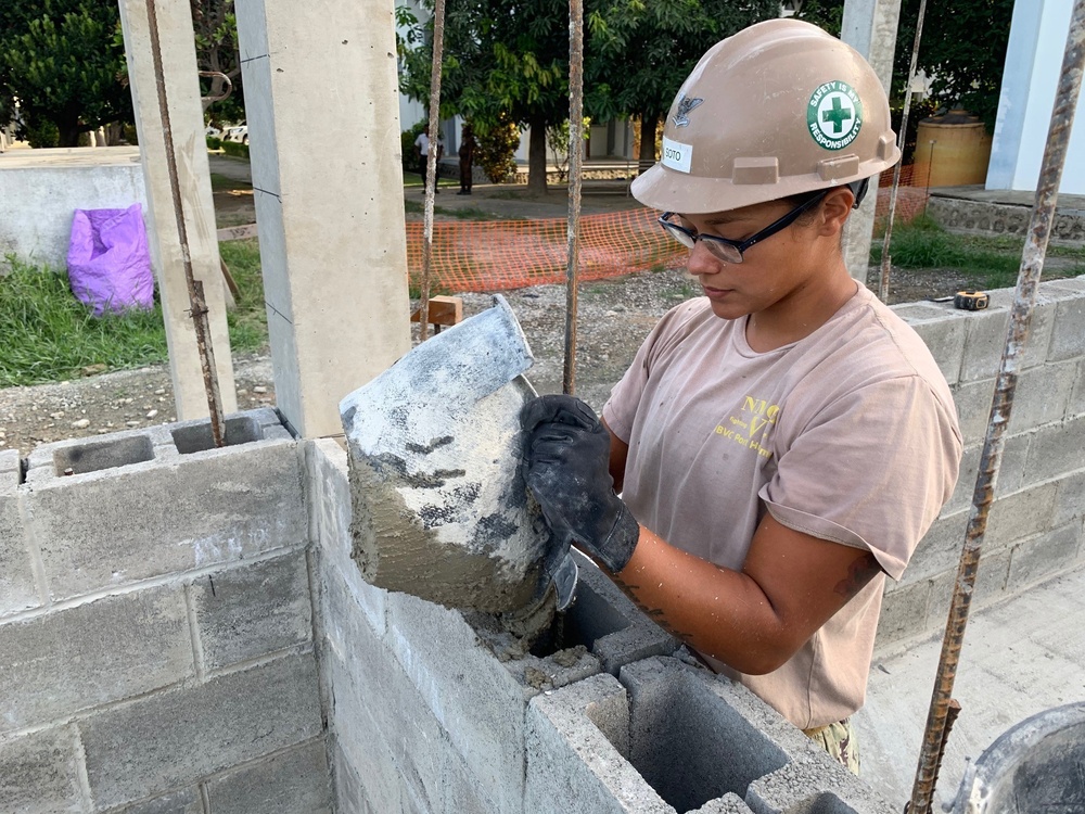 U.S. Navy Seabees with NMCB-5’s Detail Timor-Leste construct a school in support of the National Institute of Health in Dili