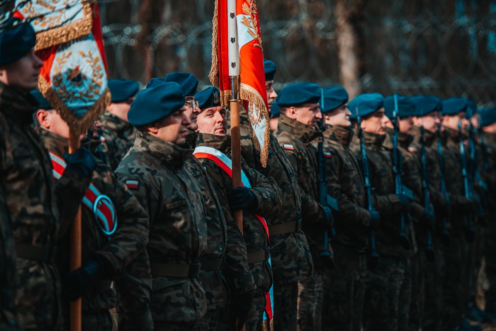 NATO eFP Battle Group Poland Soldiers honor the Polish Cursed Soldiers during Remembrance Day