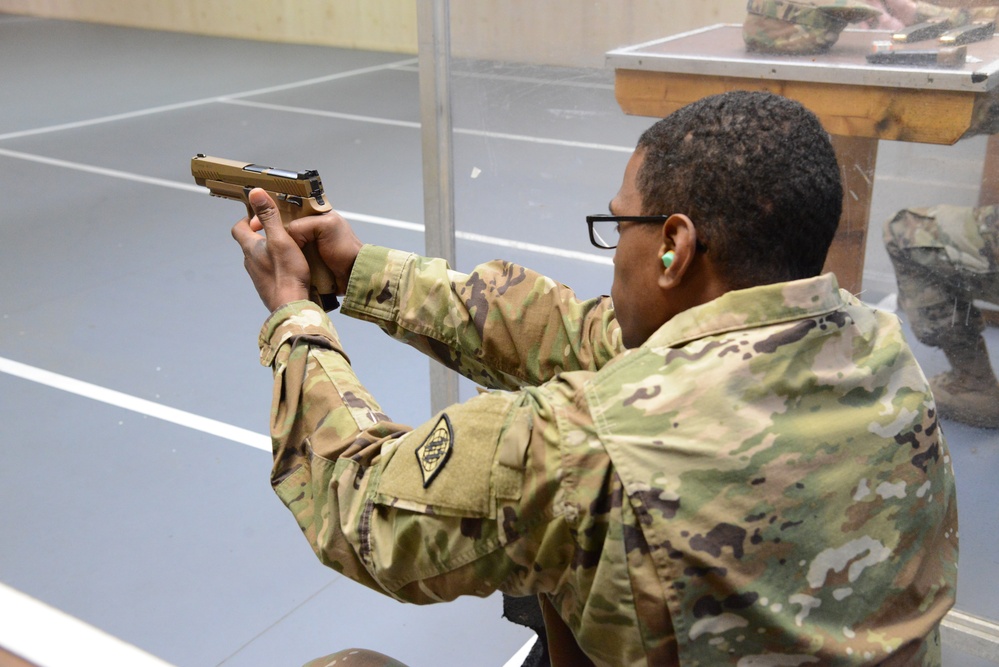 Soldiers of 39th Strategic Signal Battalion, familiarize with the new M17 pistol.