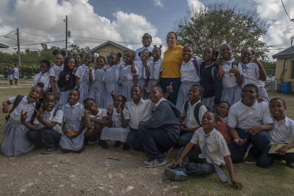 Commanding Officer Poses With Children