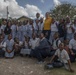 Commanding Officer Poses With Children