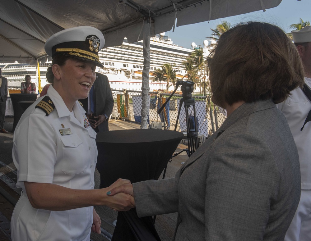 Distinguished Visitor Shakes CO's Hand