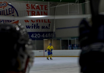 Sailor Plays Ice Hockey
