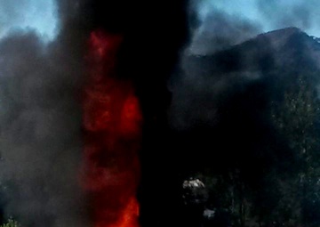 Kodiak-based Coast Guard firefighters conduct annual pit burn training