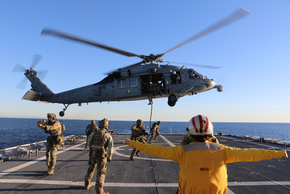 Coast Guard Cutter Munro, Navy HSC 14 and MSRT-West conduct fast rope exercises