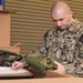 Damage Controlman 1st Class Petko Stefanov performs inventory checks