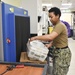 Logistics Specialist Seaman Recruit Daanzae Blandwarren sorts mail