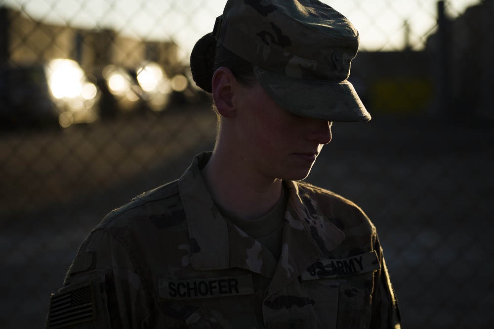 Soldier does physical training at Camp Taji