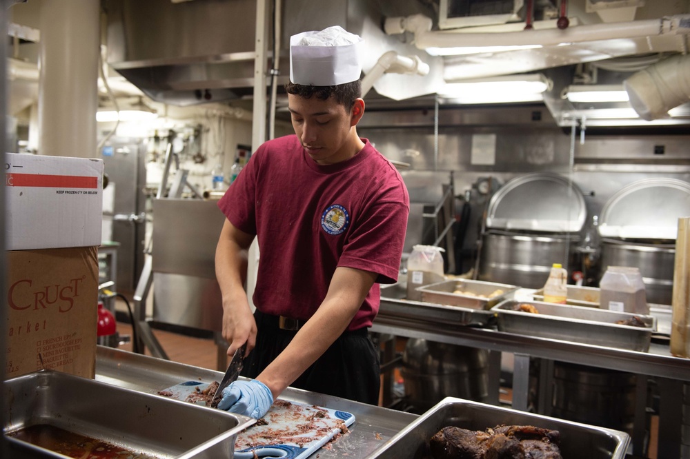 U.S. Sailor cuts beef
