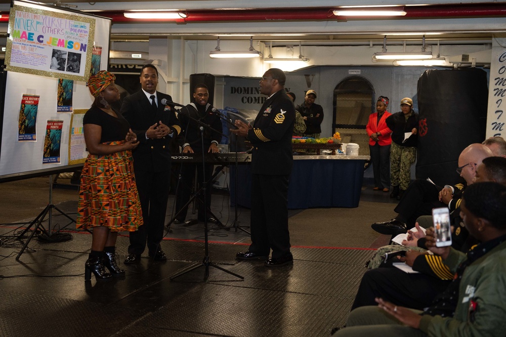 U.S. Sailor sings during a Black Hostroy Month celebration