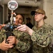 U.S. Sailors claibrate a pressure switch