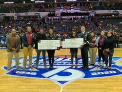 Cadet Command DCG presents Army ROTC scholarships to Cadets at the 2020 CIAA Basketball Tournament [Image 1 of 5]
