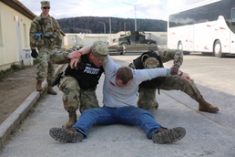 Raptor Task Force Military Police Drag Simulated Casualty to Safety