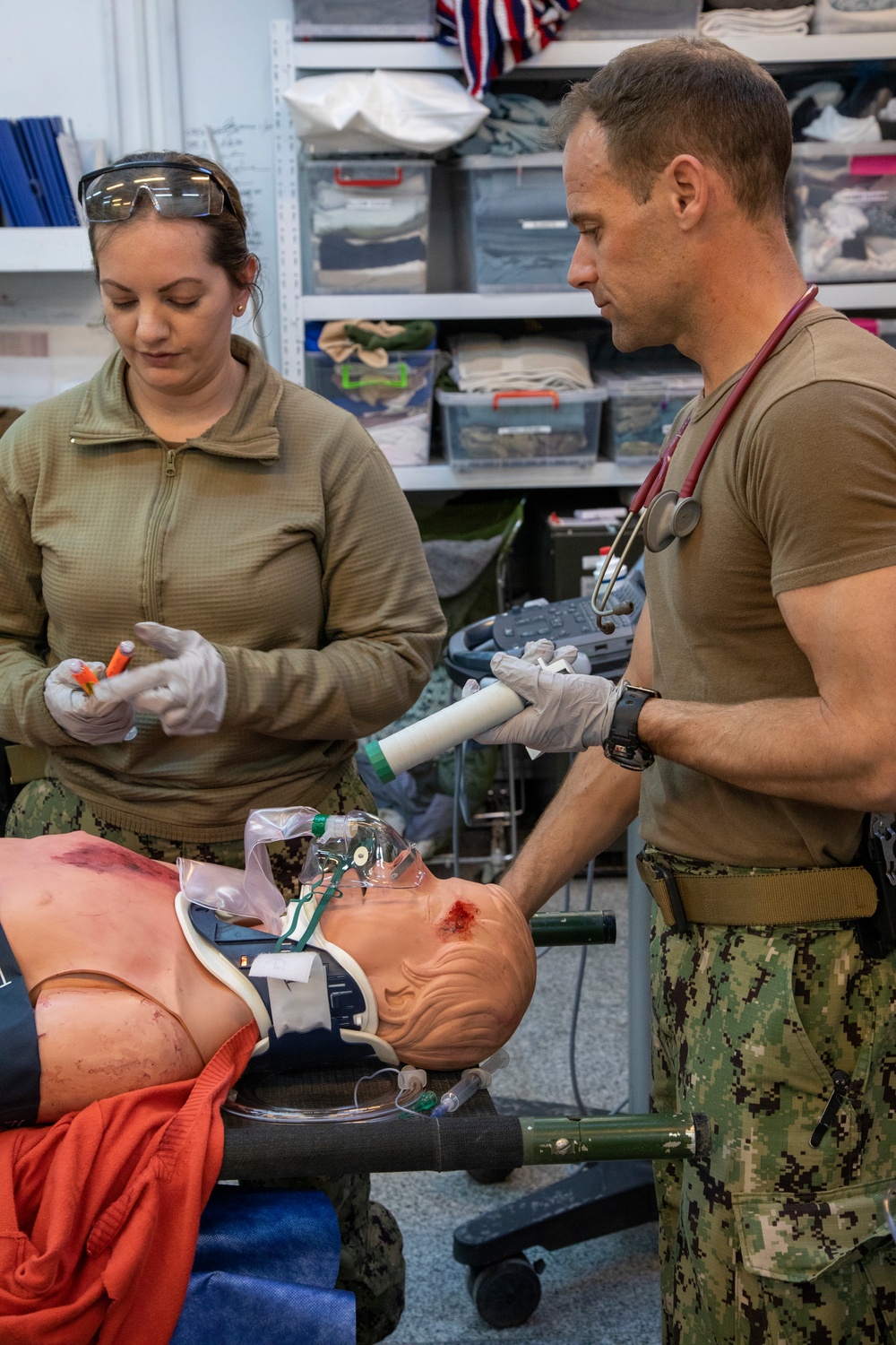 Physicians demonstrate medical procedure for local health care workers