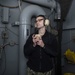 U.S. Sailor uses sound powered phone