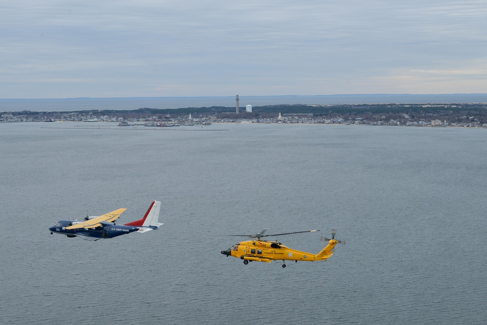 Air Station Cape Cod centennial aircraft flies over Cape Cod, Massachusetts