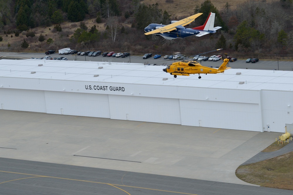 Air Station Cape Cod centennial aircraft flies over Cape Cod, Massachusetts