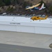 Air Station Cape Cod centennial aircraft flies over Cape Cod, Massachusetts