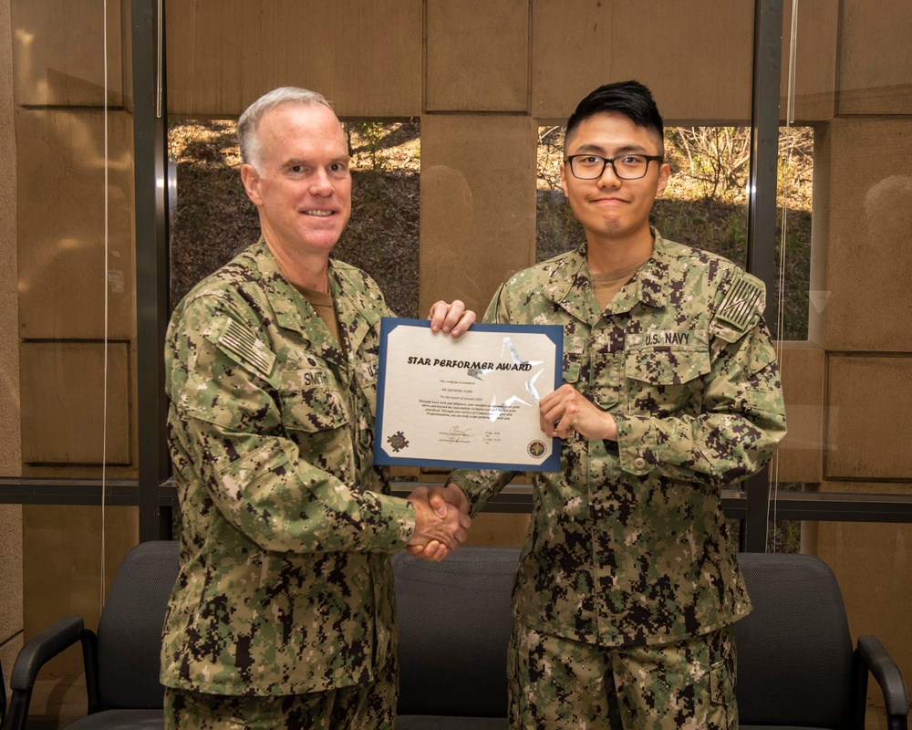 NMCSD CO Presents Sailor with Star Performer Award