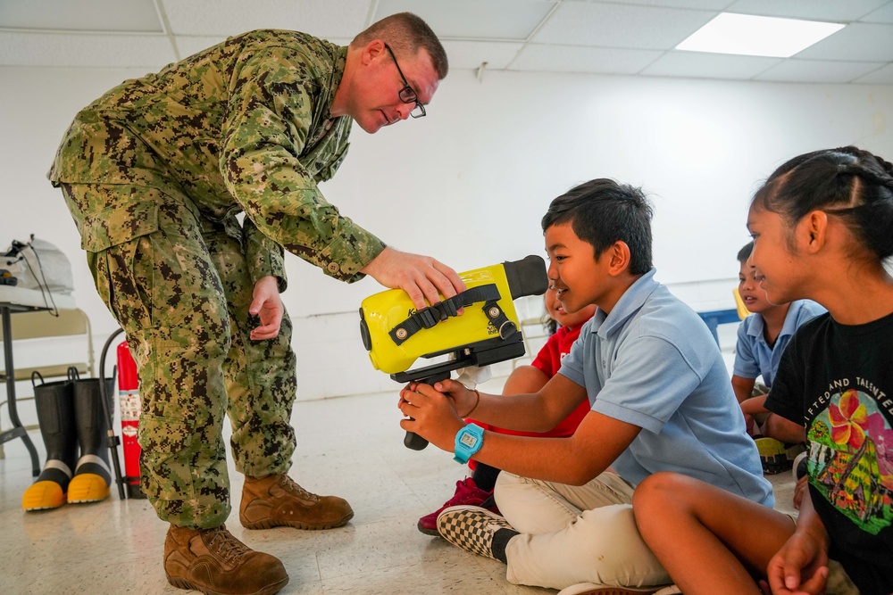 U.S. Navy Sailors Teach Marcial A. Sablan Students for Career Day