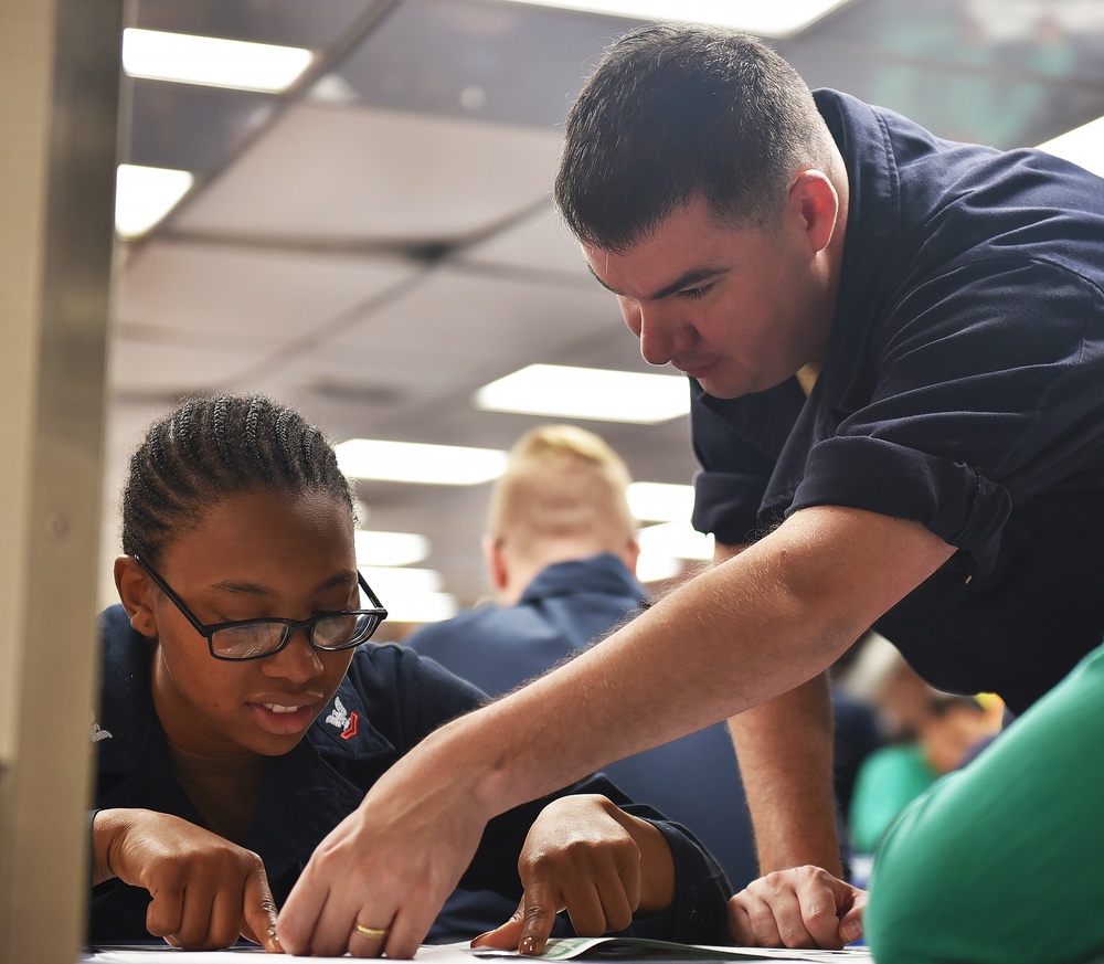 Sailors Take the E6 Advancement Exam Aboard Blue Ridge