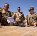 Coalition Forces transfer arms, equipment, vehicles to Iraqi forces