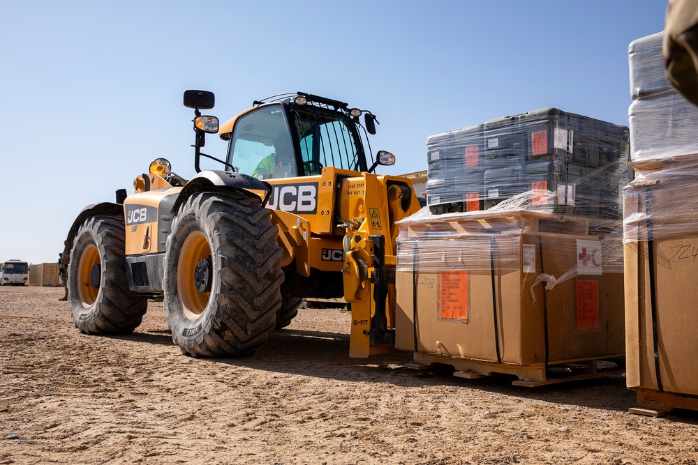 Coalition Forces transfer arms, equipment, vehicles to Iraqi forces