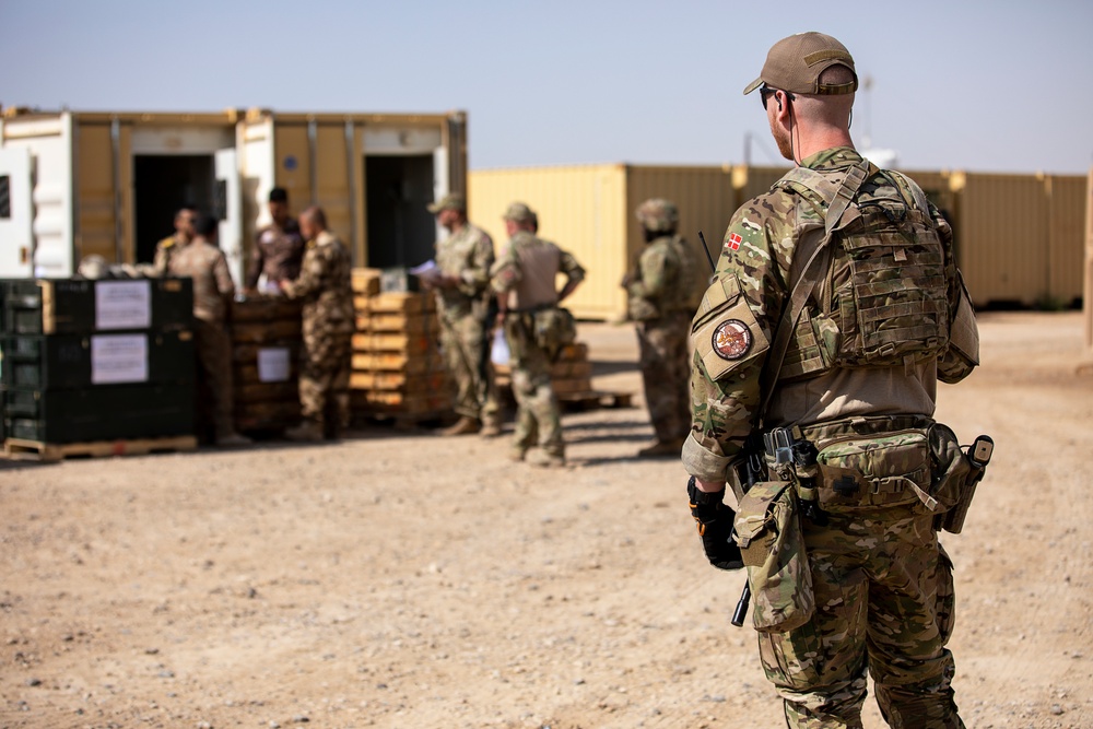 Coalition Forces transfer arms, equipment, vehicles to Iraqi forces