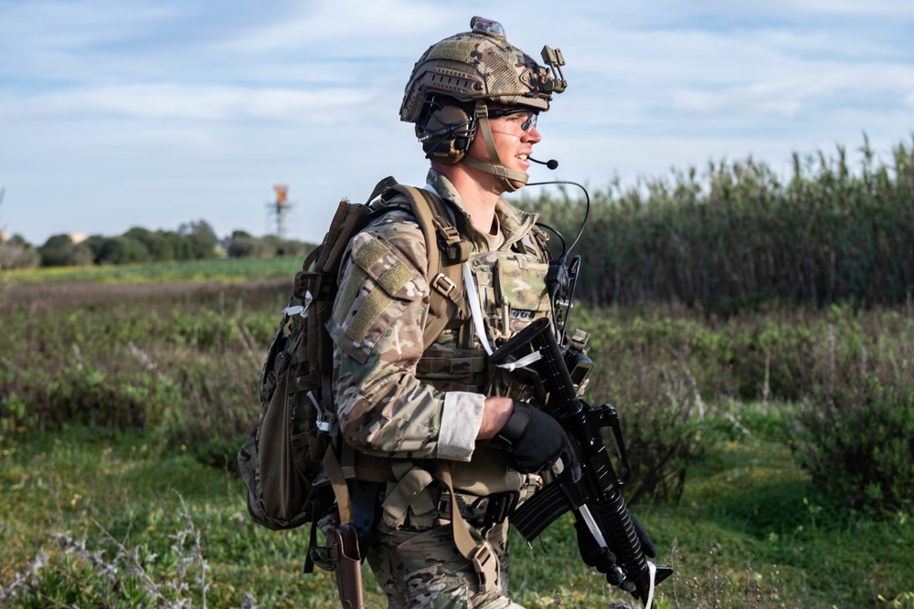 Explosive ordnance technicians conduct patrolling operations, as part of combat operation response training