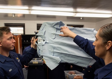 Coast Guard honor guard trainees prepare for duty