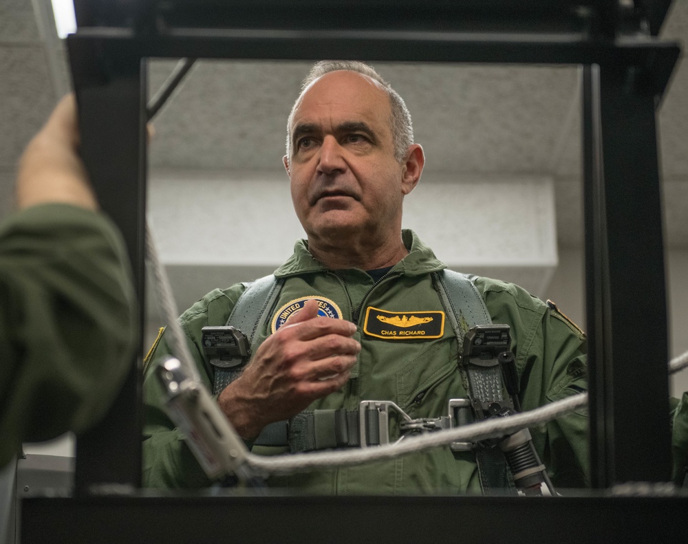 USSTRATCOM commander receives egress training before B-2 Spirit familiarization flight