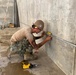 U.S. Navy Seabees with NMCB-5’s Detail Tinian Construct Explosive Ordnance Disposal Mobile Unit 5’s Boat Storage Facility