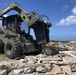 U.S. Navy Seabees with NMCB-5’s Detail Tinian embark to the island