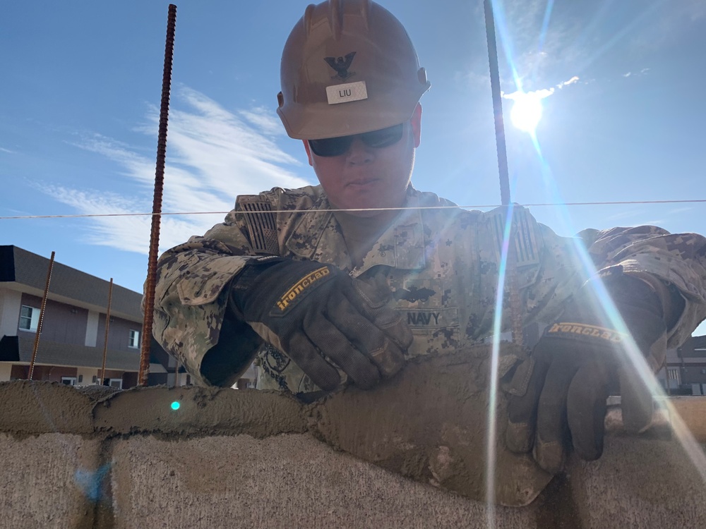 U.S. Navy Seabees deployed with NMCB-5’s Detail Iwakuni continue construction on environmental enclosures