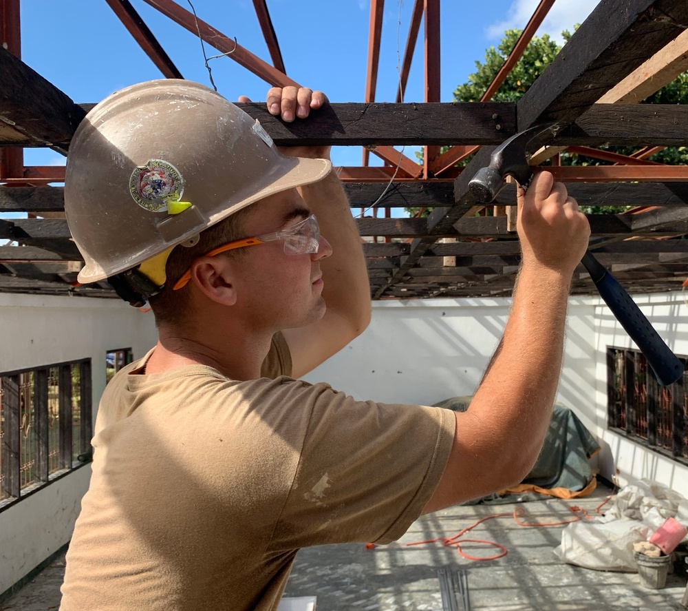U.S. Navy Seabees deployed with NMCB-5’s Detail Palawan continue construction on Magsaysay Elementary School