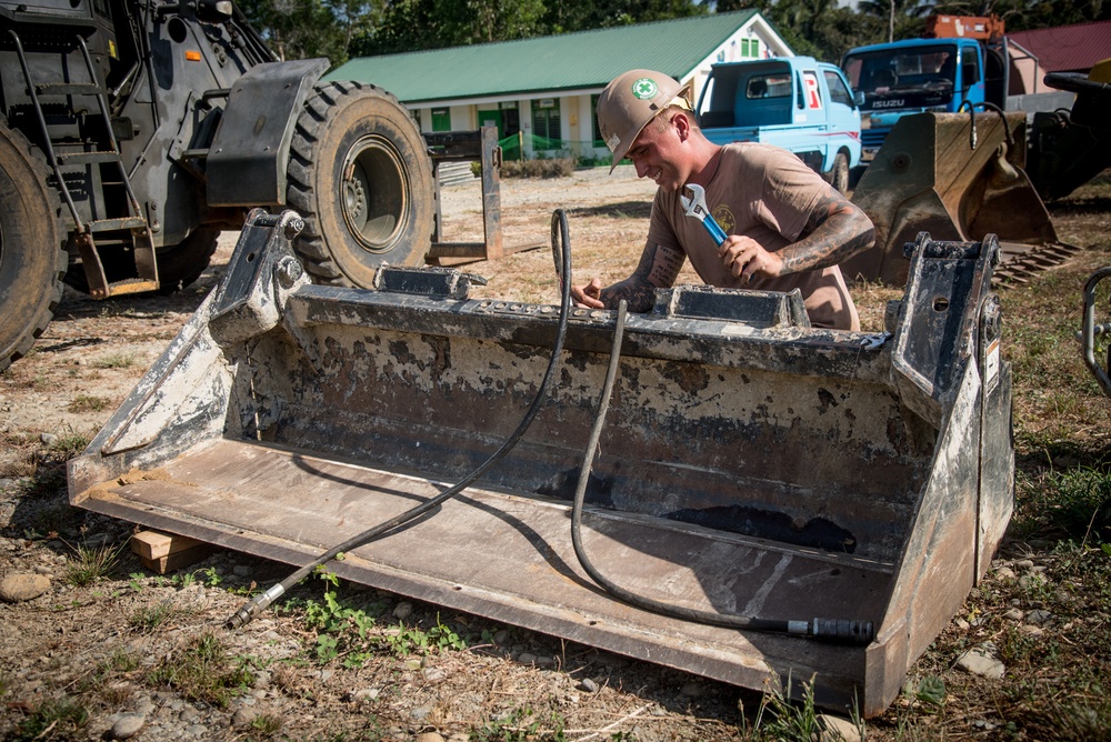 U.S. Navy Seabees deployed with NMCB-5’s Detail Palawan continue construction on Magsaysay Elementary School