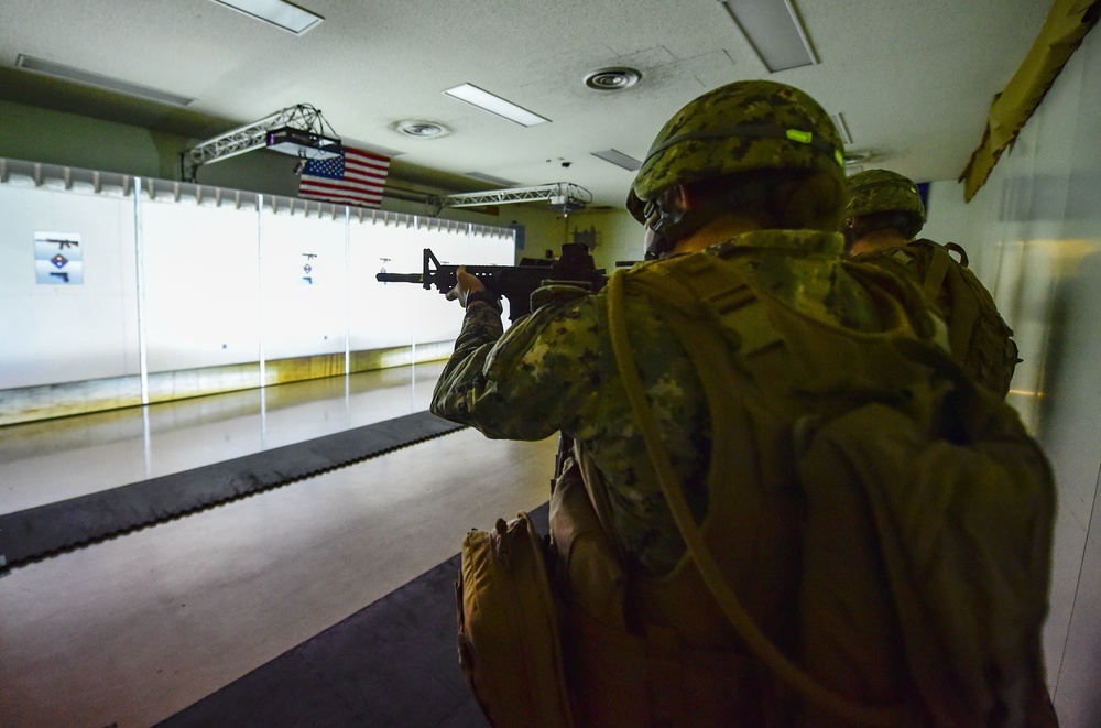 U.S. Navy Seabees with NMCB-5 train on board Camp Shields