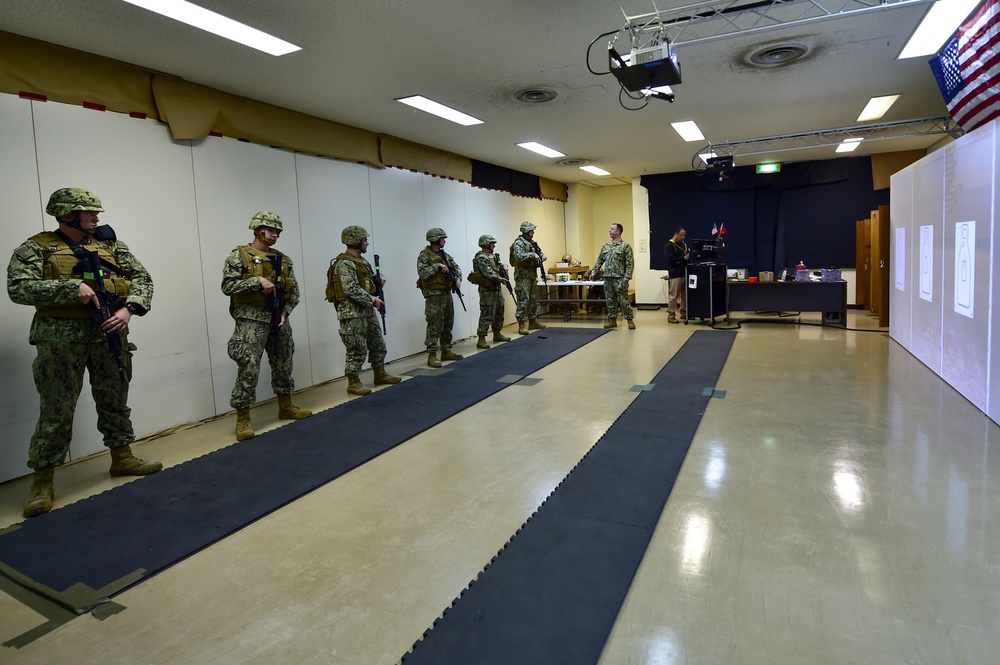 U.S. Navy Seabees with NMCB-5 train on board Camp Shields