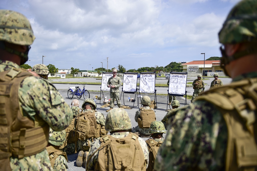 U.S. Navy Seabees with NMCB-5 train on board Camp Shields