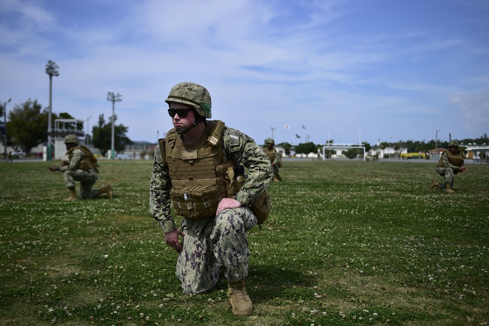 U.S. Navy Seabees with NMCB-5 train on board Camp Shields