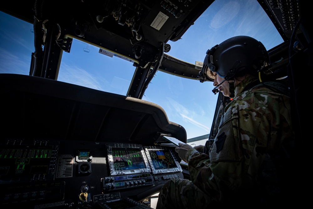 U.S. Army 1st Lt. Larissa Fluegel goes over pre-flight procedures at the Army Aviation Support Facility on Joint Base McGuire-Dix-Lakehurst, N.J., March 5, 2020.