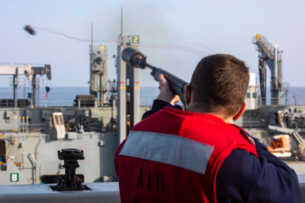 Sailors participate in a RAS