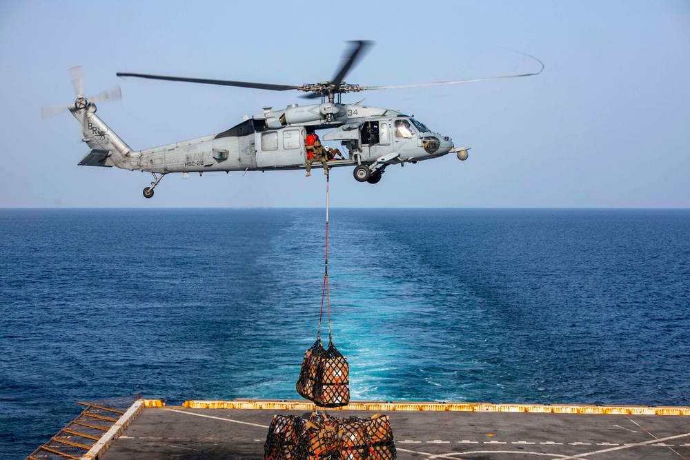 Sailors participate in a RAS