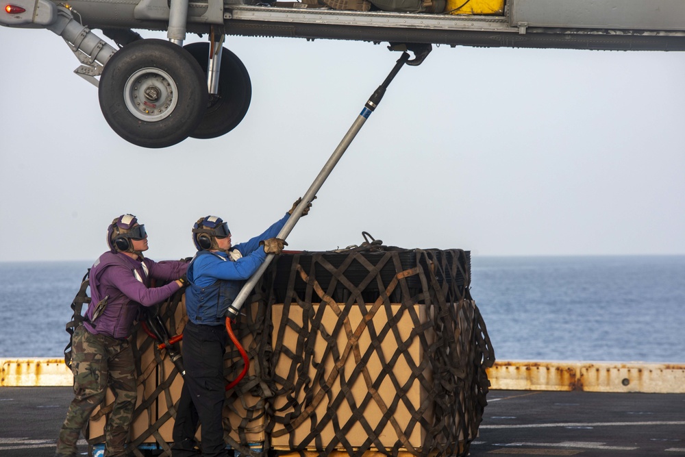 Sailors participate in a RAS